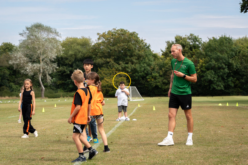 Children playing sport outdoors